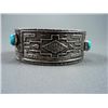 Image 2 : Sand Cast Bracelet w/ Green Stone-Marked D. Begay Weight: 87.7 Grams Retail: $720.00