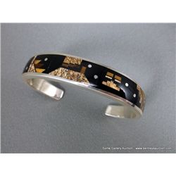 Sterling Inlaid Bracelet w/ Brown Stone Western Pattern-Marked C Weight: 41.4 Grams Retail: $700.00