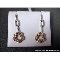 18K White Gold and 18K Yellow Gold Dangle Star Pattern Earrings~1.31ct Tw Weight: 5.8 Grams Retail: 