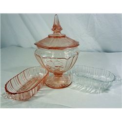 Lot of Depression Glass, two candy dishes and one footed bowl with lid.