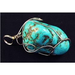 NATURAL 204.32CTW TURQUOISE WIRE WRAPPED PENDANT