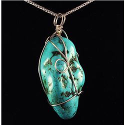 NATURAL 164.52CTW TURQUOISE WIRE WRAPPED PENDANT