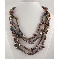 4 ROW NATURAL PEARL 700.50CTW NECKLACE W/ BOTTON LOCK