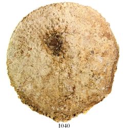 Encrusted stone grinding wheel.