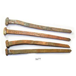 Lot of 4 bronze spikes (intact).