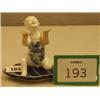 Image 1 : Unusual antique oriental kneeling figure on leaf shaped base in blue and white, bears signature,...