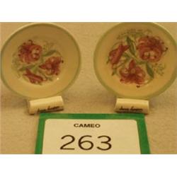 Two miniature Susie Cooper handpainted plates on stands, 2.5  in diameter £30 - 50...