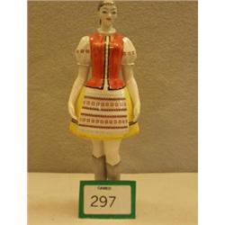 Hungarian figure of young girl in national costume £20 - 40...