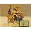 Image 1 : Antique porcelain figure of courting couple, hand painted and heavily decorated, 7" high, bears g...