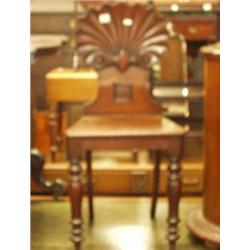 Early Victorian mahogany hall chair with shell shaped back with turned legs £60 - 80...