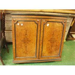 Mid Victorian veneered two door cabinet with ebony inlay £200 - 300...