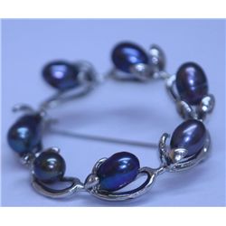 51.80 CTW BLACK PEARL BROOCH