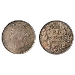 AN OUTSTANDING 1900 FIFTY CENTS PIECE.