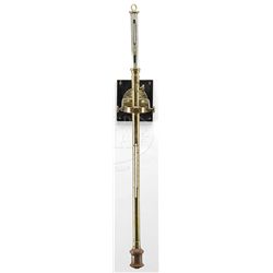 GIMBALED BRASS MARINE BAROMETER.
