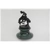 Image 2 : Miniature Remington sculpture copy on stand,  approx. approx. 6” in height.  Est.:   $50-$75.