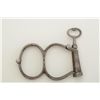 Image 1 : Hiatt “Figure 8” handcuffs with key marked  “767” in overall good condition; cuffs  numbered “144” a
