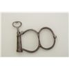 Image 2 : Hiatt “Figure 8” handcuffs with key marked  “767” in overall good condition; cuffs  numbered “144” a