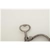 Image 3 : Hiatt “Figure 8” handcuffs with key marked  “767” in overall good condition; cuffs  numbered “144” a