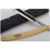 Image 2 : Carl Schaaf, Solingen straight razor with  celluloid handle in Wilh. Schaaf two-piece  box; razor in