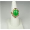 Image 1 : Spectacular 18 karat yellow gold ladies ring  set with a cabochon apple green Jade weighing  approx.