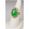 Image 2 : Spectacular 18 karat yellow gold ladies ring  set with a cabochon apple green Jade weighing  approx.