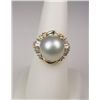 Image 1 : Elegant 18 karat yellow gold ladies ring set  with a Tahitian pearl averaging 12.00 MM in  diameter 