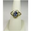 Image 3 : Stylish 14 karat yellow gold ladies ring set  with an oval Ceylon type color sapphire  weighing appr