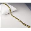 Image 3 : Brilliant 14 karat two-tone gold ladies  custom made bracelet channel set with 288  baguette and rou