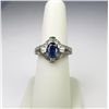 Image 1 : Gorgeous 14 karat white gold ladies ring set  with a Ceylon type color sapphire weighing  approx. 1.