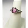 Image 1 : Charming 14 karat white gold ladies ring set  with a pink tourmaline weighing approx. 1.50  carats a