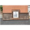 Image 2 : Handmade wooden display rack showing portrait  of John Wayne, approx. 49” long x 19” in  height and 