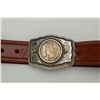 Image 2 : Leather belt with silver Peace dollar in  buckle dated 1926. Est.:  $50-$75.