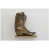 Image 2 : Brass boots sculpture, approx. 5” in height.   Est.:  $25-$50.