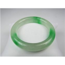 Nice child’s green and white jade bangle.  Estimate $100-$300