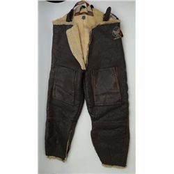 WW II era aviator’s flight pants, leather  with fleece lining; overall good condition  for age.  Est