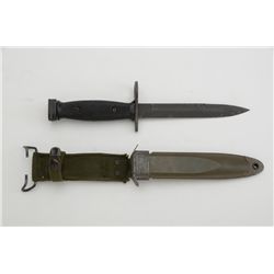 M-7 bayonet with U.S. M8A1 sheath by PWH in  overall good condition.  Est.:  $25-$50.