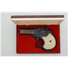 Image 1 : High Standard Model DM-101 O/U derringer, .22  Magnum cal., 3-1/2” barrels, blue finish,  faux ivory