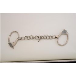 Tower Double Lock leg irons, nickel plated,  with key, in very good condition and working  at time o