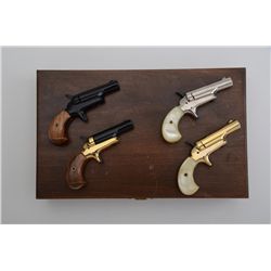 Cased set of 4 modern Butler single shot  derringers, all .22 short cal., all 2-1/2”  barrels and in