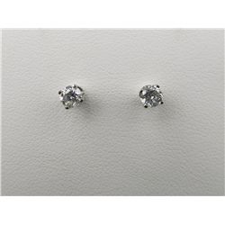 Brilliant 14 karat white gold ladies diamond  earrings set with two round brilliant cut  diamonds we