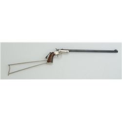 Stevens tip-up pocket rifle, .22 cal., 15”  barrel, blue and nickel finish, wood grips,  metal skele