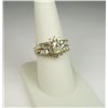 Image 1 : Gorgeous 14 karat yellow gold ladies custom  made ring set with an oval cut diamond  weighing approx