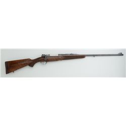 Holland & Holland bolt action rifle, .30 bore  cal., 25” round barrel, blue finish,  checkered wood