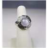 Image 1 : Mesmerizing 14 karat white gold ladies custom  made ring set with a fine blue-gray star  sapphire we