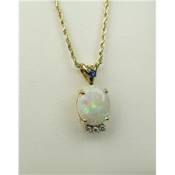 High quality 14 karat yellow gold ladies  necklace set with a fine quality Australian  Opal weighing