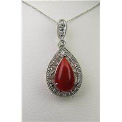 Intricate 14 karat white gold ladies vintage  design necklace set with a fine cabochon  Italian red 