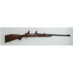 Remington Model 700 bolt action rifle, .458  Win. Mag. cal., 24” round barrel, blue  finish, checker