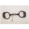 Image 2 : Bean handcuffs with key, working at time of  description, overall good condition, dark  patina, circ