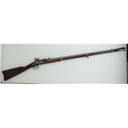 Needham conversion of a Civil War percussion  rifle, .58 cal., 37” barrel, wood stock,  #NVSN. This 