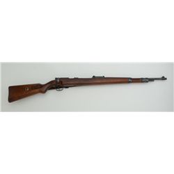 Mauser bolt action training rifle, .22LR  cal., 26” barrel, blue finish, wood stock,  leather sling,